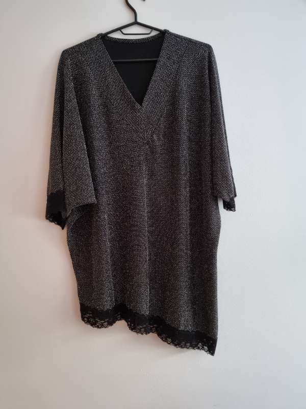 Svartur og silfur mussa