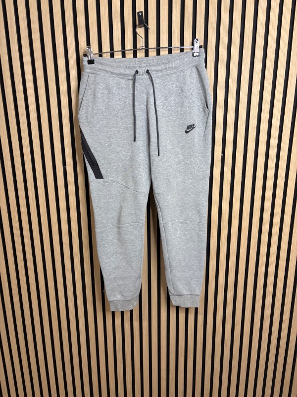 Nike fleece teck buxur