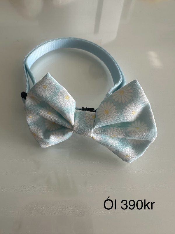 Blá slaufu ól m.blómum