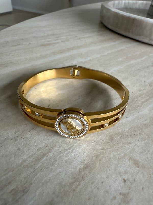 Dior medecine gold bracelet