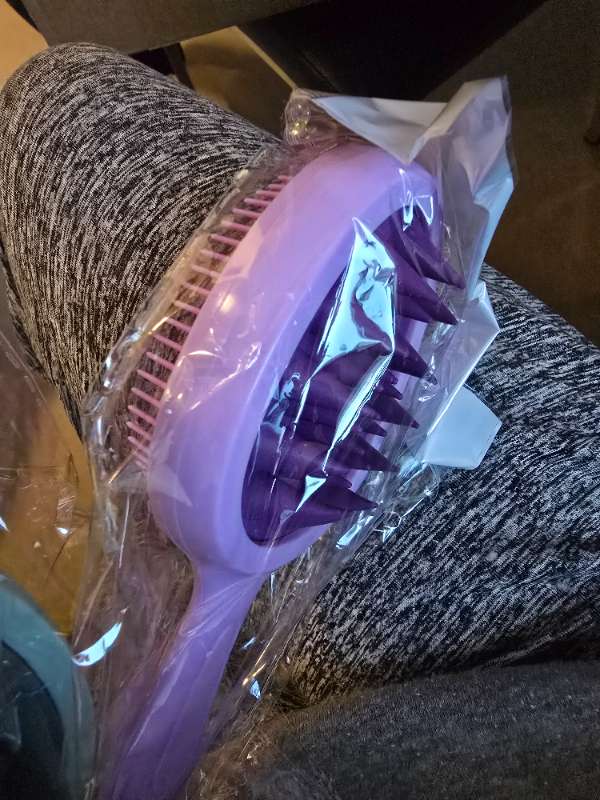 Nuddbusti og bursti í sturtu