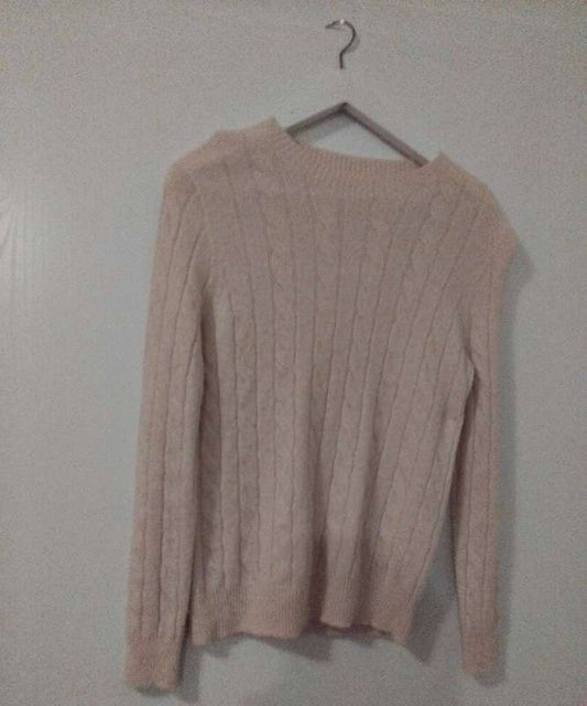Peysa. Ljós. Composition 100% Wool.