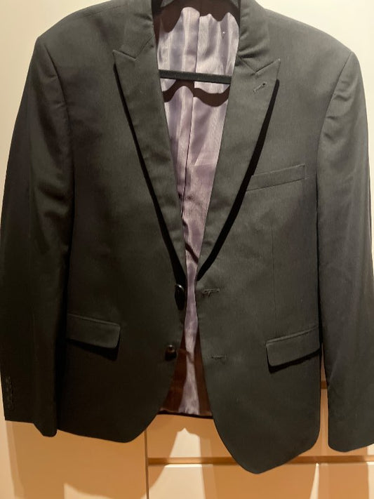 Next jakkafatajakki svartur