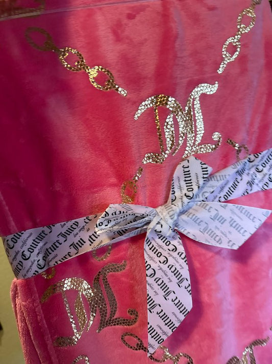 Juicy Couture bleikt teppi