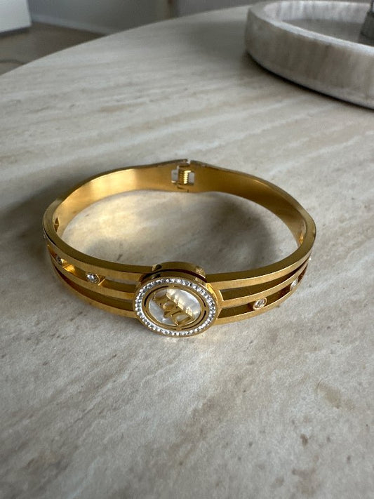 Dior medecine gold bracelet