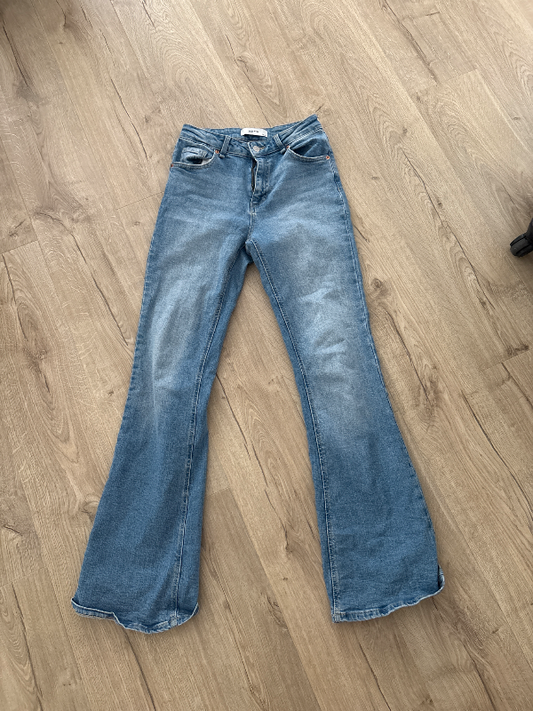 Ljósláar denim gallabuxur